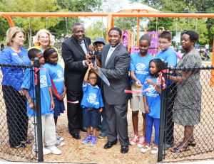 Oct. 2012, From left to right: Mary Ellen Webb, TD Bank; Pam Paul; Edward Waters College President Nat Glover; Mayor Alvin Brown; Peggy Wade and kids from Boys & Girls Club of Northeast Florida at the ribbon cutting for Success Park