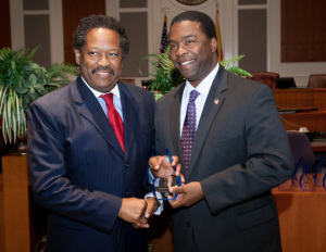 Shown is the late Dr. Chester Aikens receiving the Trailblazer Award from former Jacksonville Mayor Alvin Brown