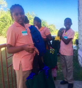 The children individually greeted each member of the delegation.