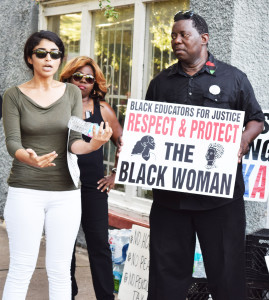 Shown protesting on 9th and Liberty Street, the site where unarmed Vernell Bing was shot and killed by a Jacksonville Sheriff’s Officer are  Sara Mahmoud and James Evans speaking to movement supporters.