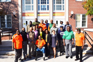 Pictured L-R are committee members Charles Sutton (seated) surrounded by Bobby Newsome, Bobby Bailey, Katherine Beatty (MWG Assistant Principal), James Cotton, Anthony “Tony” Hill, Harriett Jarrett, Jessie Johnson, Harold Graves, Dr. Tyrus Lyles (MWG Principal), Kenneth Manual, Curtis Miranda, DCPS District 4 Paula Wright, Ervin Norman, Charles Sapp, Daniel Scott, Jackie Surrency and Leon Smith. SMV photo 