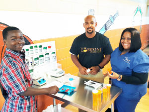 Shown at the grand opening are DAndre Jones, Dr. Albert Chester and instructor nurse Tia Hadley